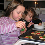 Colette and Lela baking cookies